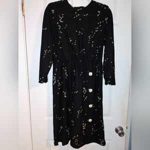 Elegant Black Dress with Button Detail